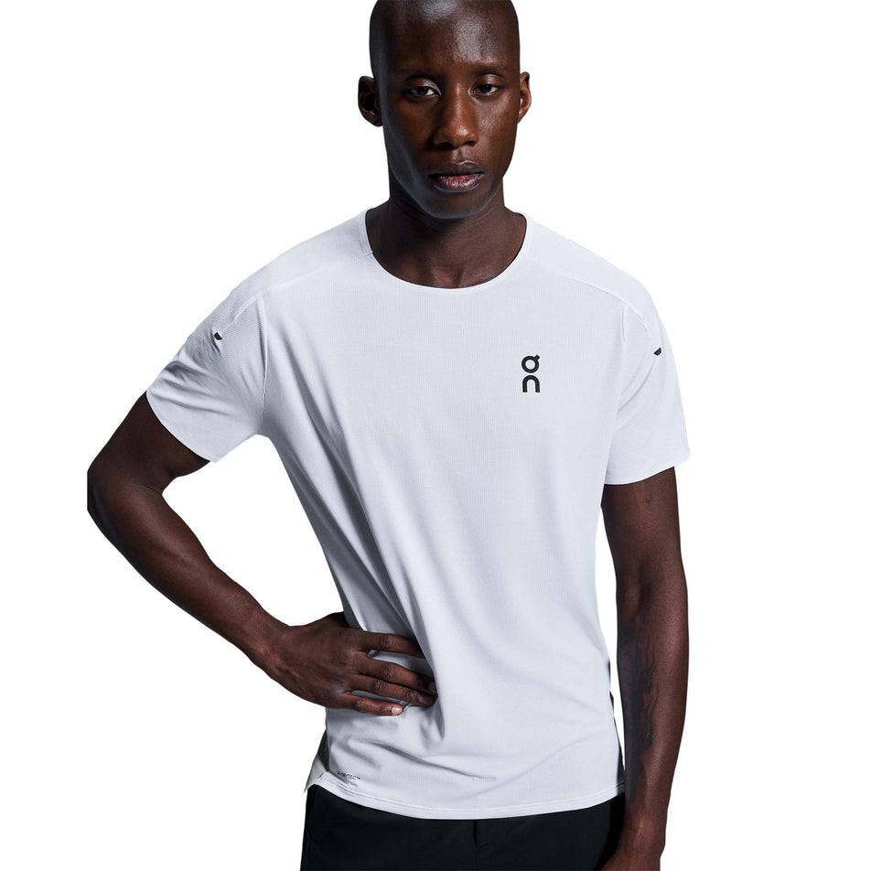 Front view of a model wearing the On Men's Performance-T in the White/Silver colourway. (8715745951906)