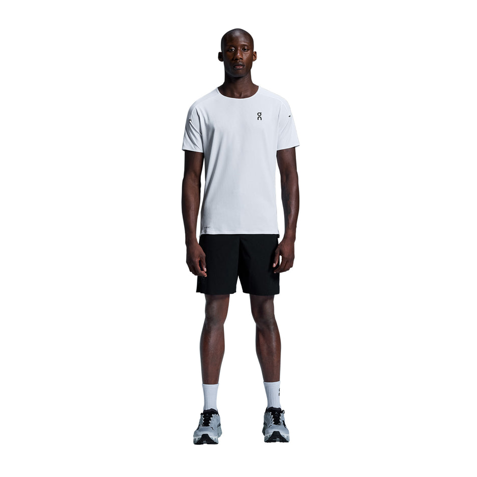 Front view of a model wearing the On Men's Performance-T in the White/Silver colourway. (8715745951906)