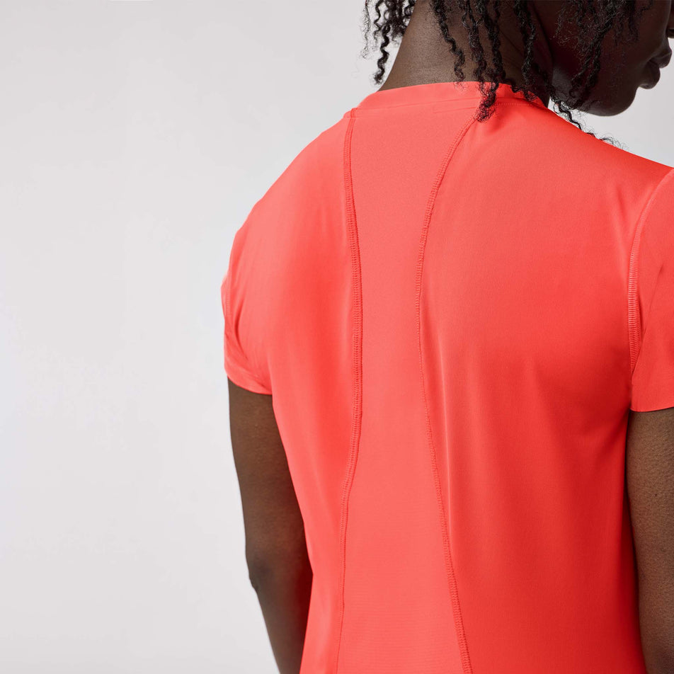 Back view of a model wearing the Brooks Women's Sprint Free Short Sleeve 3.0 in the Neo Cayenne colourway. (8575025676450)