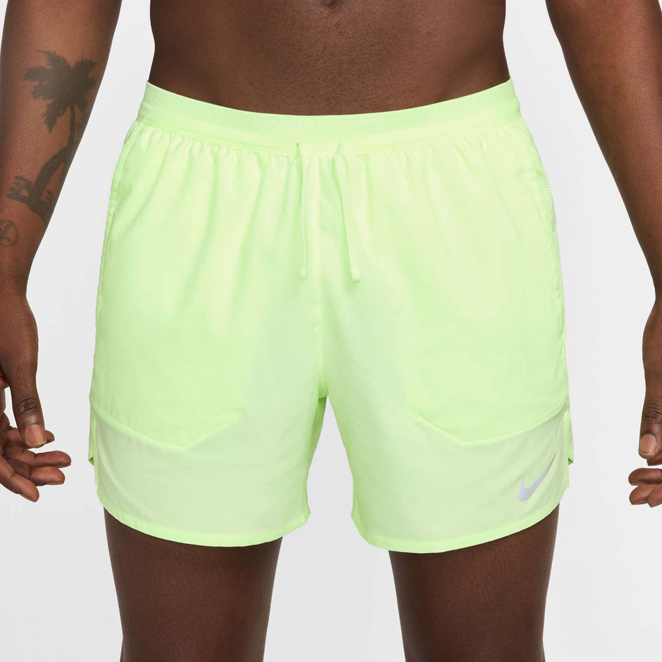 Front view of a model wearing a pair of Nike Men's Stride Dri-FIT 5