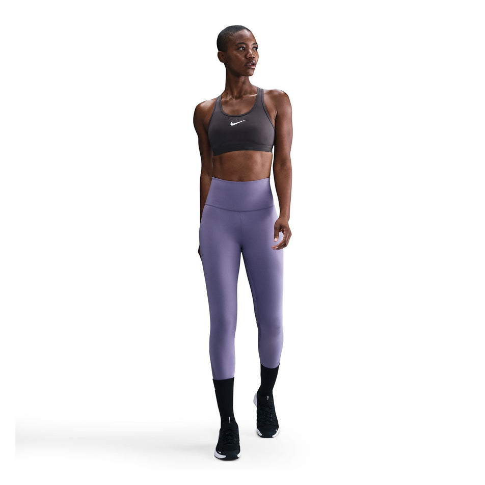 Front view of a model wearing the Nike Women's Swoosh High Support Non-Padded Adjustable Bra in the Thunder Grey colourway. (8692875165858)