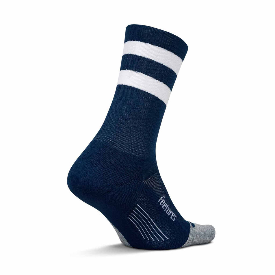 Medial side of the left sock from a pair of Feetures Unisex Elite Light Cushion Mini Crew in the Navy High Top Stripe colourway. (8583375978658)