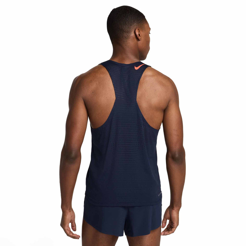 Back view of a model wearing the Nike Men's AeroSwift Dri-FIT ADV Running Singlet in the Obsidian/Bright Crimson colourway. (8574129176738)