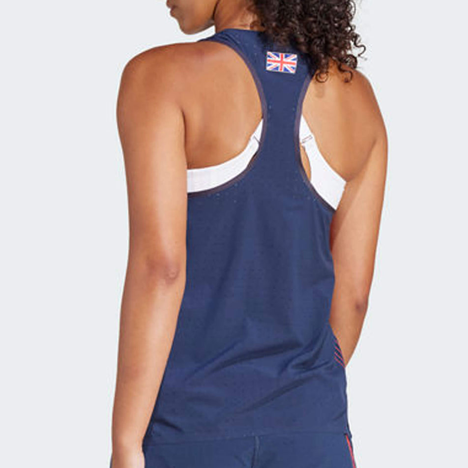 Back view of a model wearing an adidas Women's Team GB Adizero Running Tank Top in the Legend Ink colourway. (8323995795618)