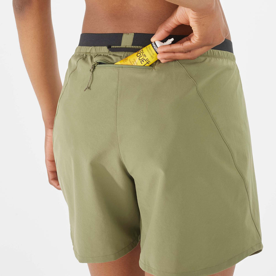 Close-up back view of a model wearing a pair of Salomon Women's Cross 5