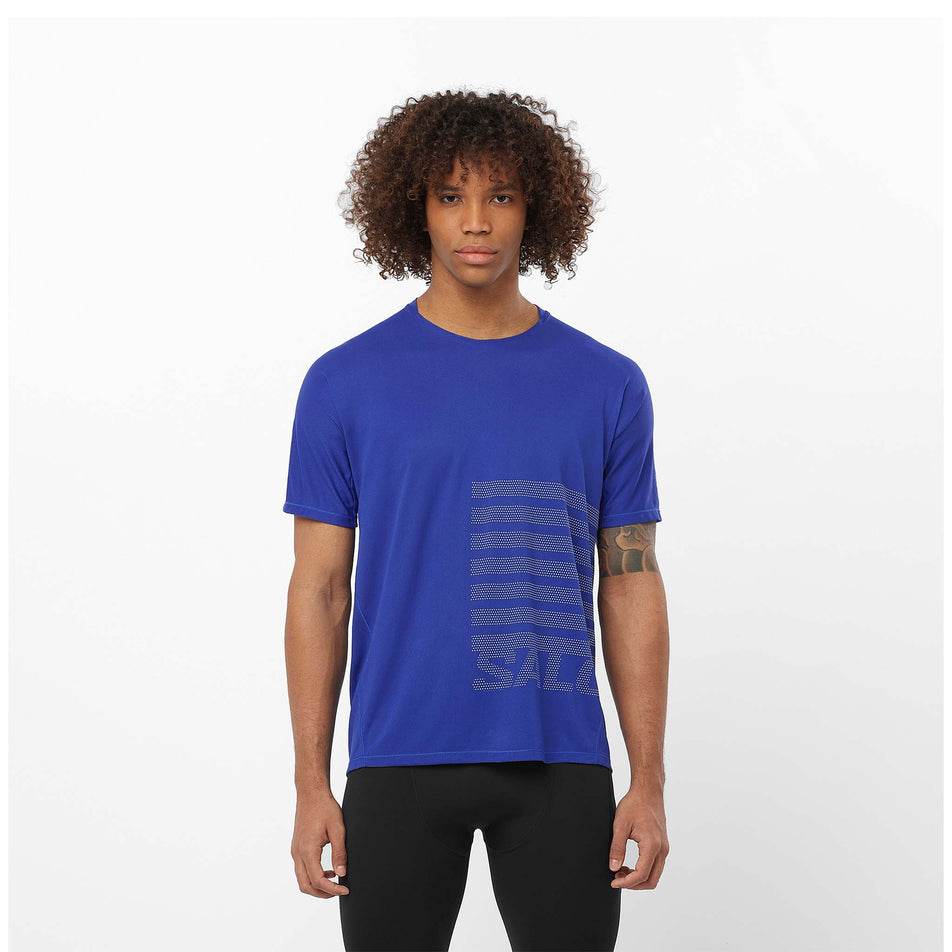 Front view of a model wearing a Salomon Men's Sense Aero Graphic Short Sleeve T-Shirt in the Surf The Web/Rainy Day colourway. Model is also wearing legwear. (8464271802530)