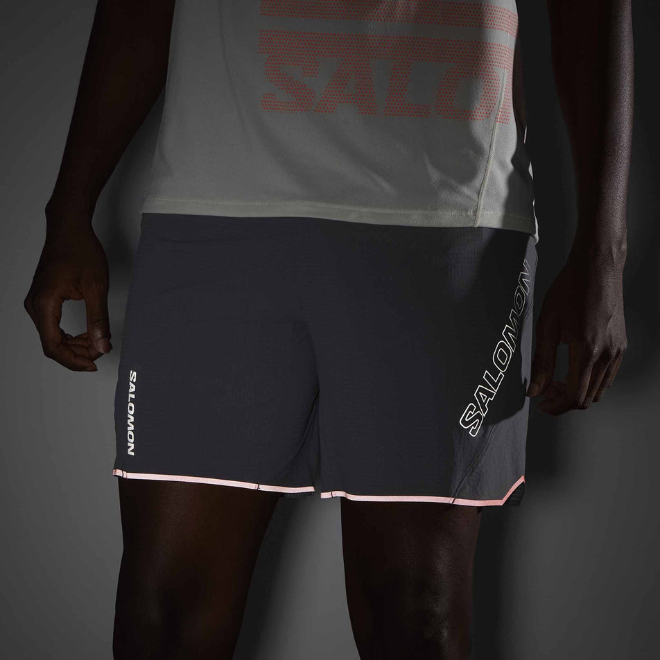 The reflective graphics on the front of the Salomon Men's Sense Aero 7