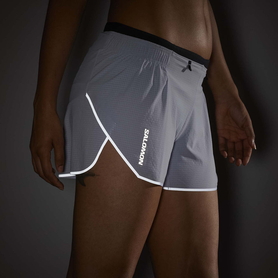 The reflective trim and reflective Salomon logo on the Women's Salomon Sense Aero 3