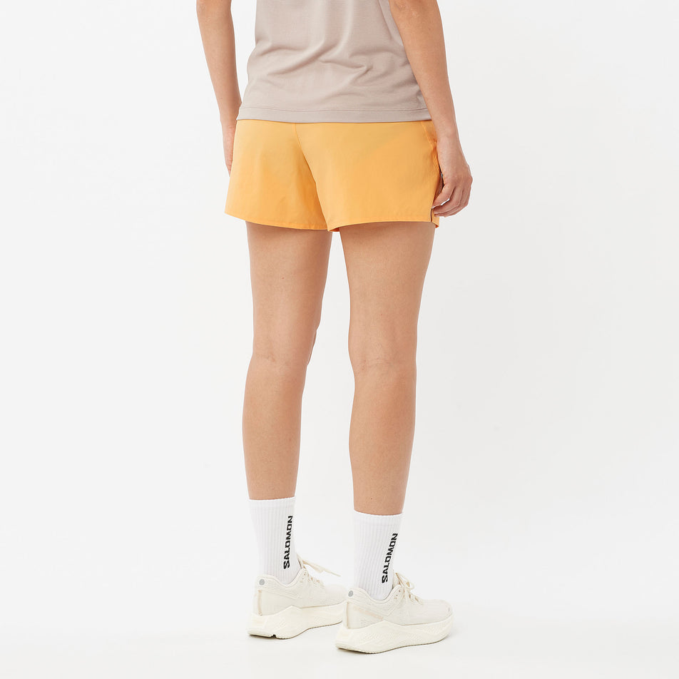 Back view of a model wearing the Salomon Women's SHKout Core 4