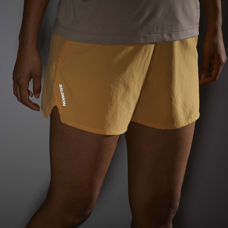 The reflective Salomon logo on the side of the Salomon Women's SHKout Core 4