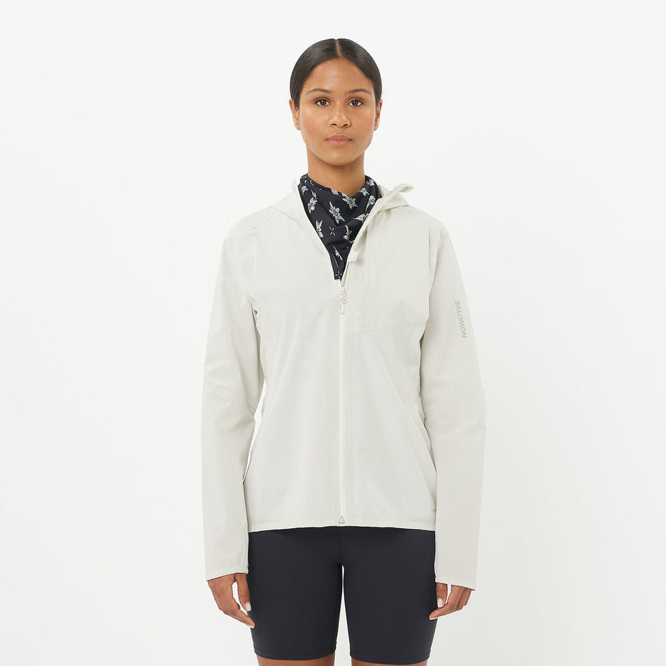 Front view of a model wearing the Salomon Women's Bonatti Trail Shell Jacket in the Icicle colourway. (8576408846498)