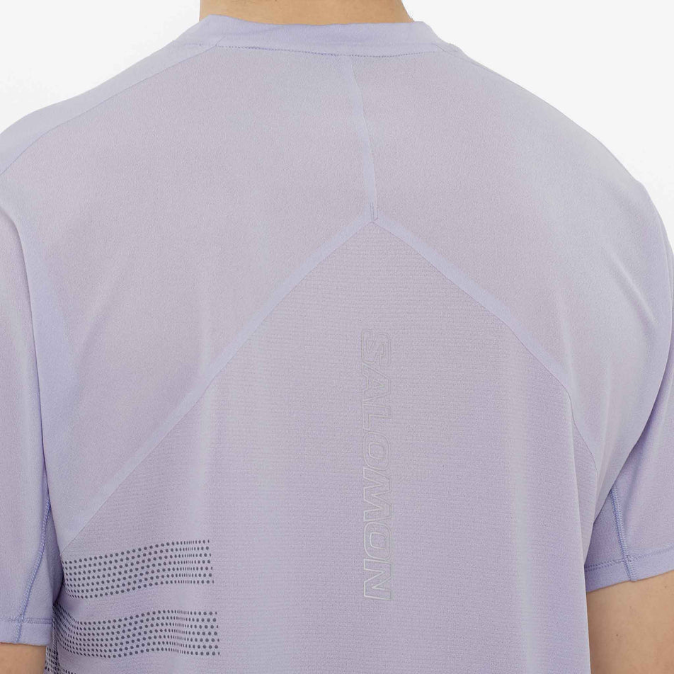 Back view of a model wearing the Salomon Men's Salomon Sense Aero Graphic Short Sleeve T-Shirt in the Cosmic Sky/Castlerock colourway. (8577957068962)