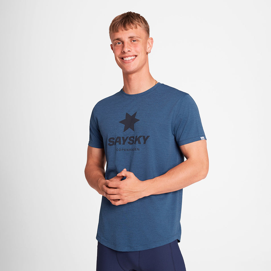 Front view of a model wearing the SAYSKY Logo Combat Pro T-Shirt in the Blue colourway. (8730913669282)