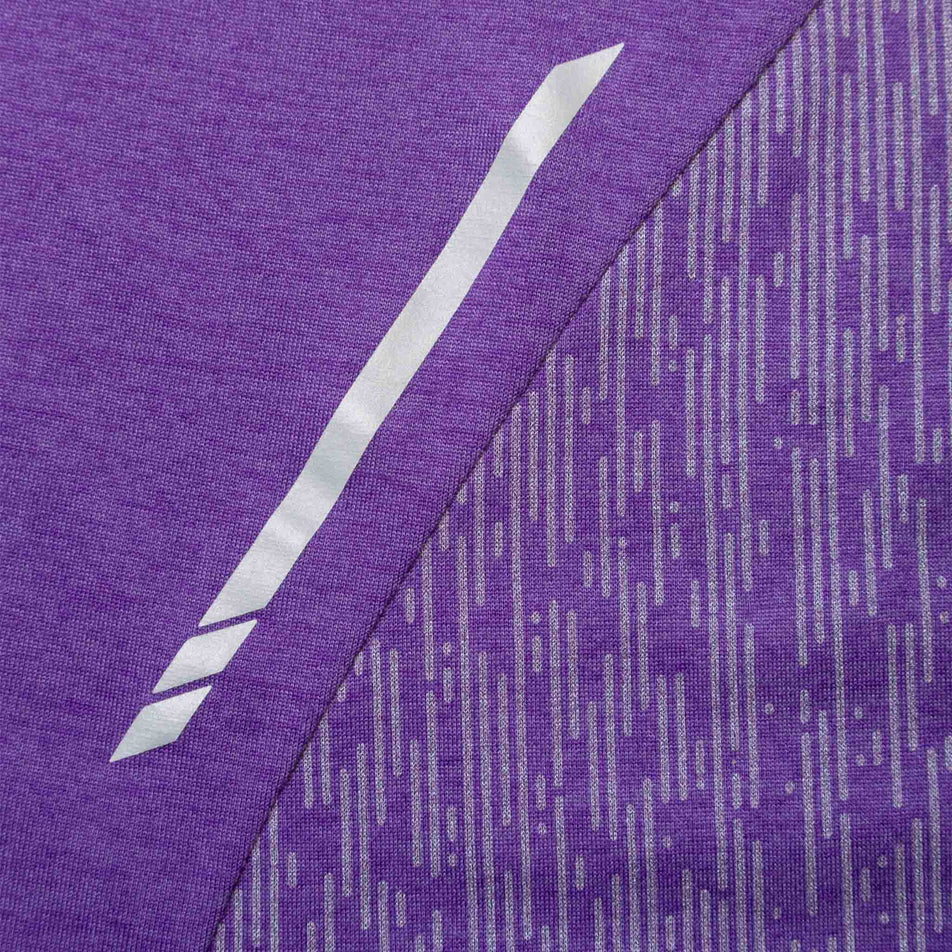Close-up view of the fabric on a Ronhill Women's Tech Reflect S/S Tee in the Regal Purple/Reflect colourway. (8489750397090)