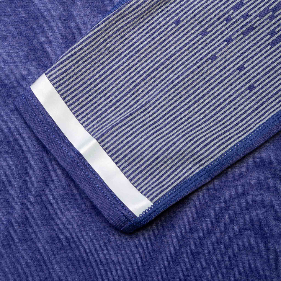 Close-up view of the fabric on a Ronhill Women's Tech Reflect L/S Tee in the Deep Ocean/Reflect colourway. (8489718874274)