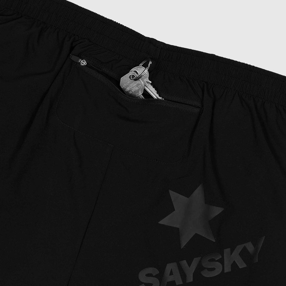 Keys sticking out of the zipped back pocket of the SAYSKY Men's 2 In 1 Pace Shorts 5