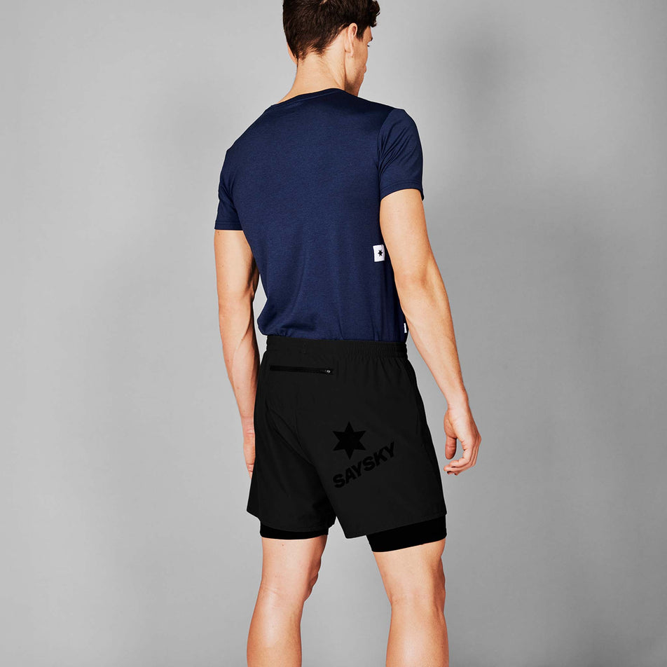 Back view of a model wearing the SAYSKY Men's 2 In 1 Pace Shorts 5