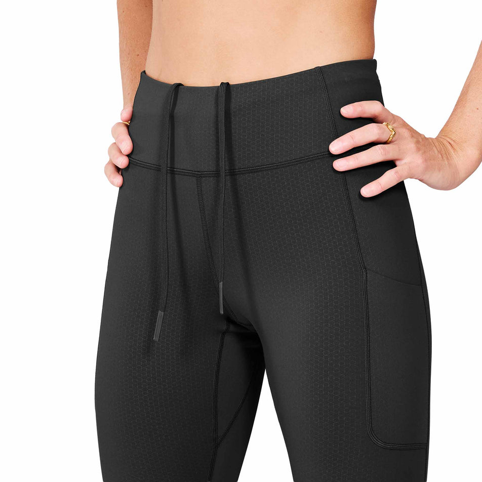 Front view of a model wearing the SAYSKY Women's Combat+ Long Tights in the Black colourway. (8730959478946)